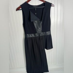 Bcbg blouse size small black with faux lining and a zipper